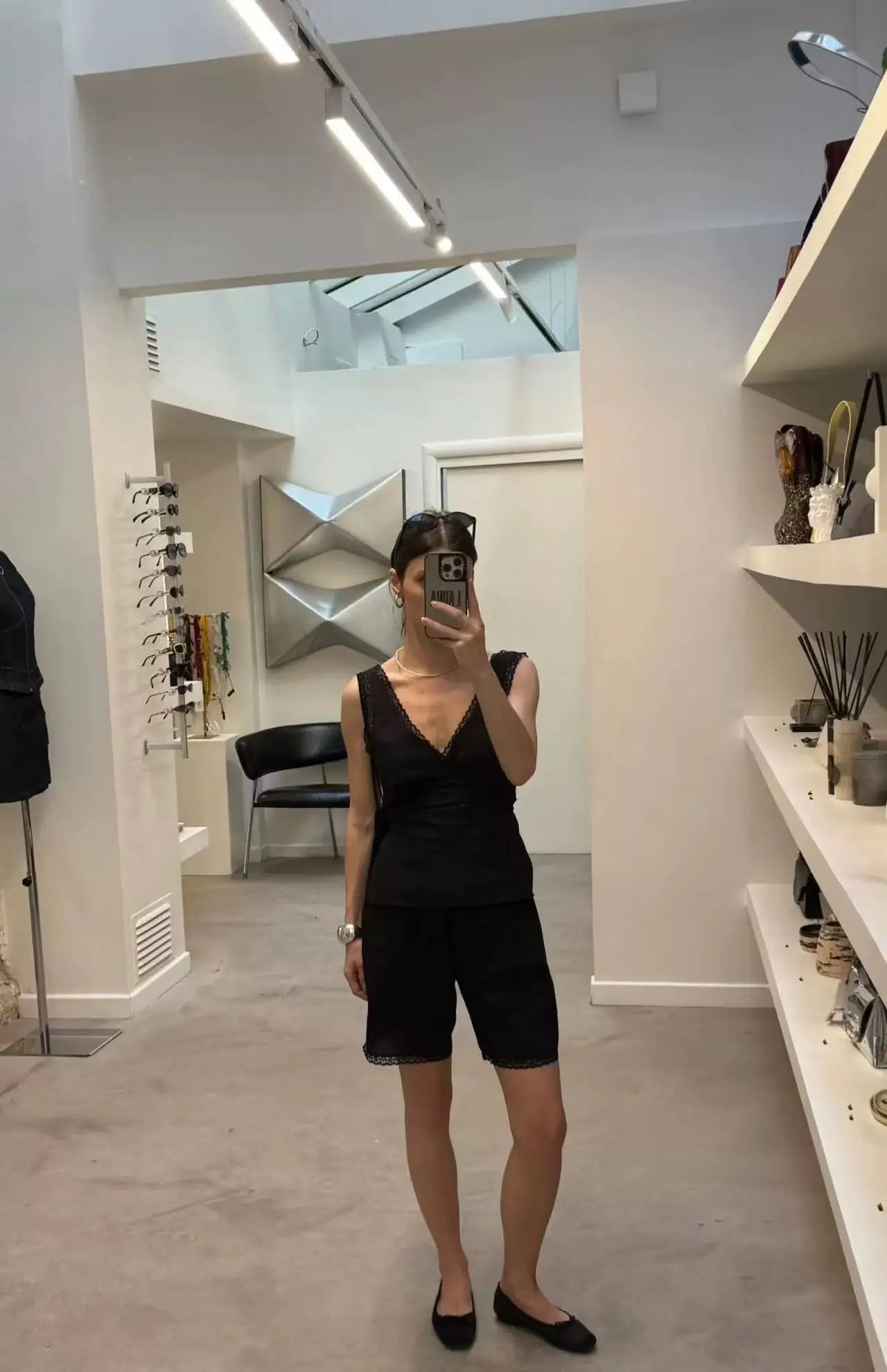 Coucou Black and white lace V-neck crop top and simple elegant straight-leg pants