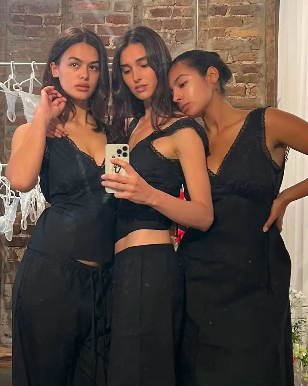 Coucou Black and white lace V-neck crop top and simple elegant straight-leg pants